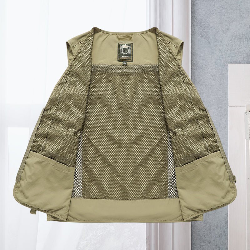 Lightweight men's travel vest, multi-pocket design for essentials & comfortable exploration.