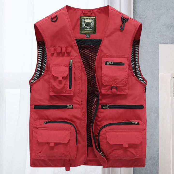 Durable men's outdoor vest, multi-pocket design for hiking, camping, and adventure gear.