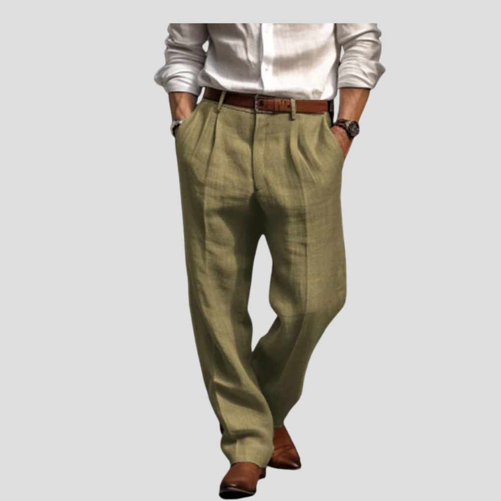 Elegant men's pleated linen pants for summer, combining comfort with a refined straight leg style suitable for occasions.