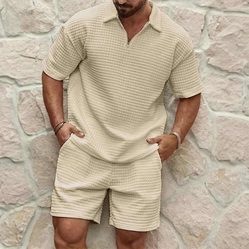 Men's two-piece leisure set in soft poly-cotton, featuring a breathable waffle knit. Ideal casual summer outfit.