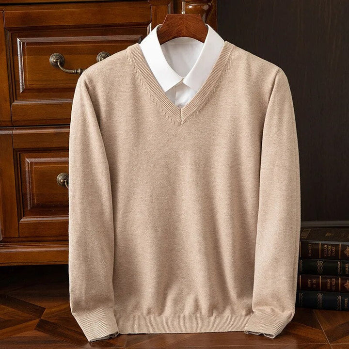 Versatile men's knit V-neck sweater, long-sleeve pullover for comfortable layering in cold weather.