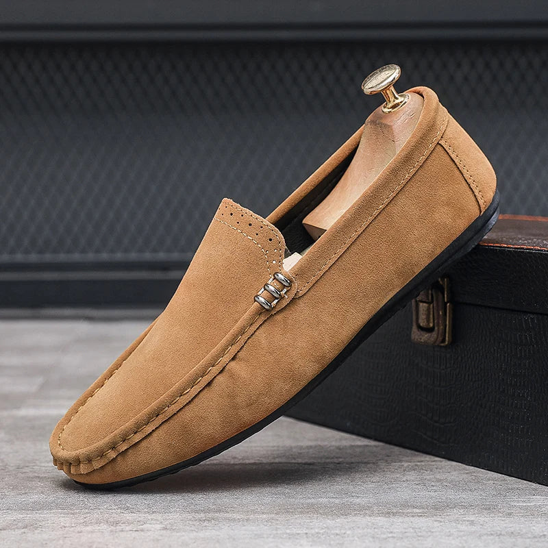 Close-up of the textured upper of men's orthopedic comfort loafers, highlighting stitch detail.