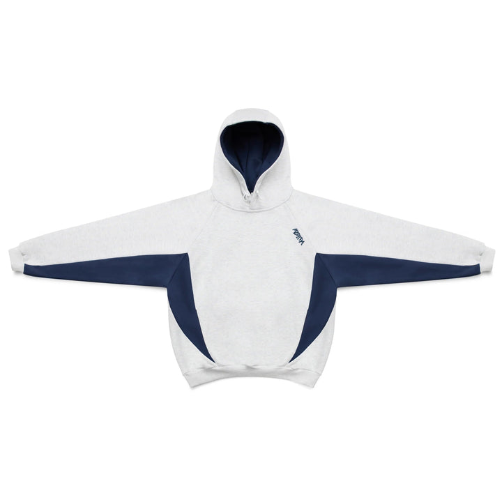 Sporty men's oversized hoodie with contrasting panels. Comfortable, trendy layering piece for casual fashion.