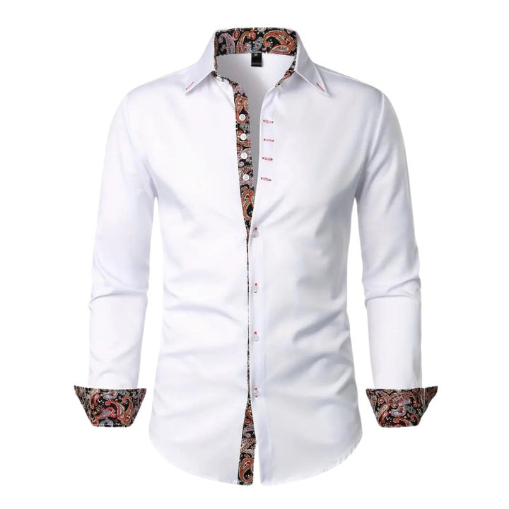 Close-up of elegant men's paisley patterned long sleeve slim fit shirt. Distinctive style for party or casual.