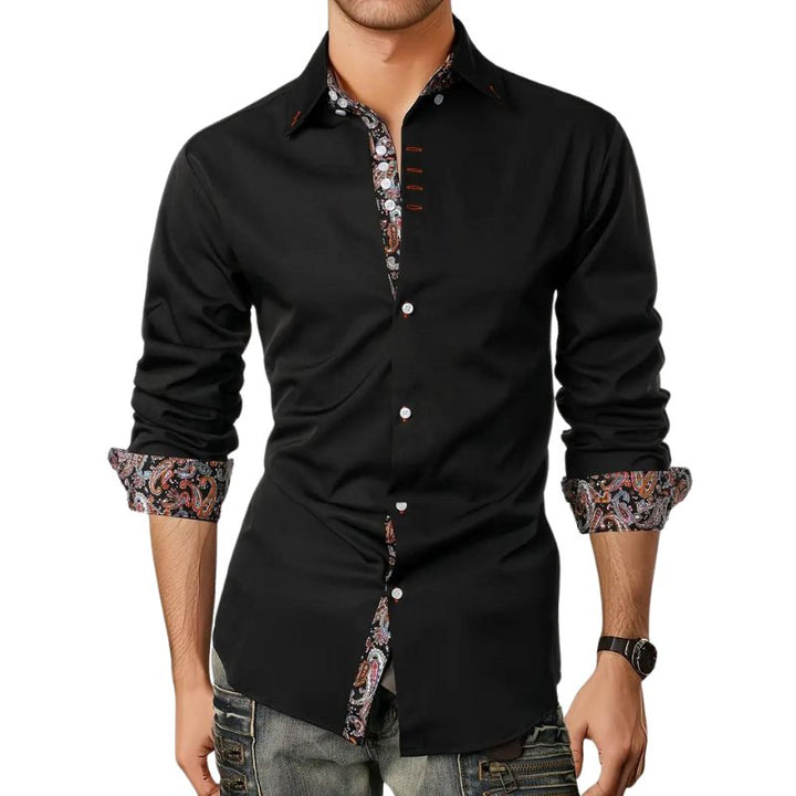 Dynamic view of a man in a stylish paisley slim fit long sleeve shirt, perfect for modern menswear.