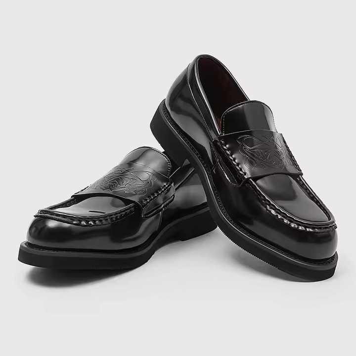 Men's polished black classic loafers, perfect for formal footwear, business attire & gentlemen's style.