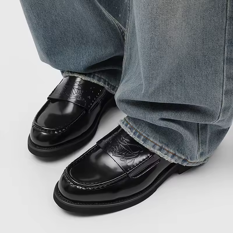 Professional men's black loafers. Comfortable slip-on dress shoes for formal events, business or smart casual wear.