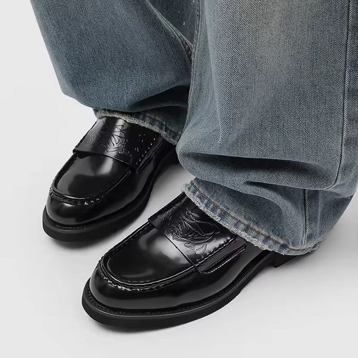 Professional men's black loafers. Comfortable slip-on dress shoes for formal events, business or smart casual wear.