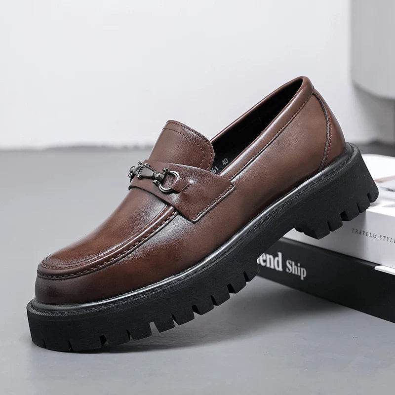 Men's polished black dress loafers, perfect for a sharp, professional business casual look.