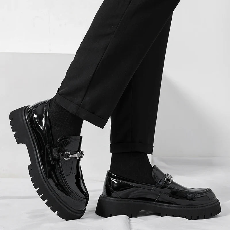 Black polished men's slip-on loafers, perfect for a sharp, comfortable, and professional dress shoe style.