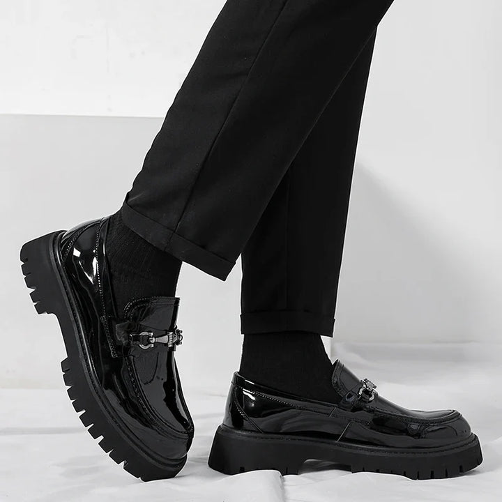 Black polished men's slip-on loafers, perfect for a sharp, comfortable, and professional dress shoe style.