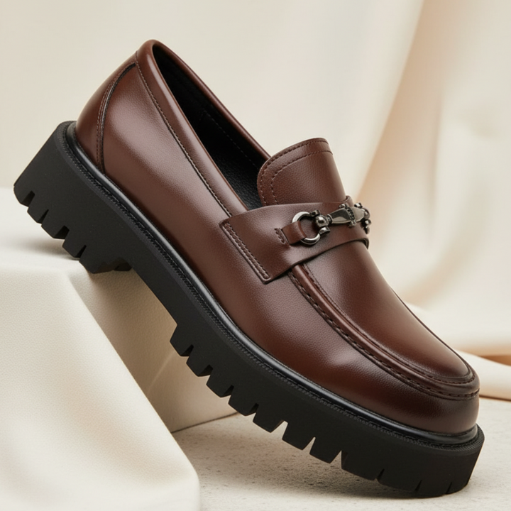Sleek men's slip-on loafers with a high-shine finish, ideal for formal and stylish outfits.