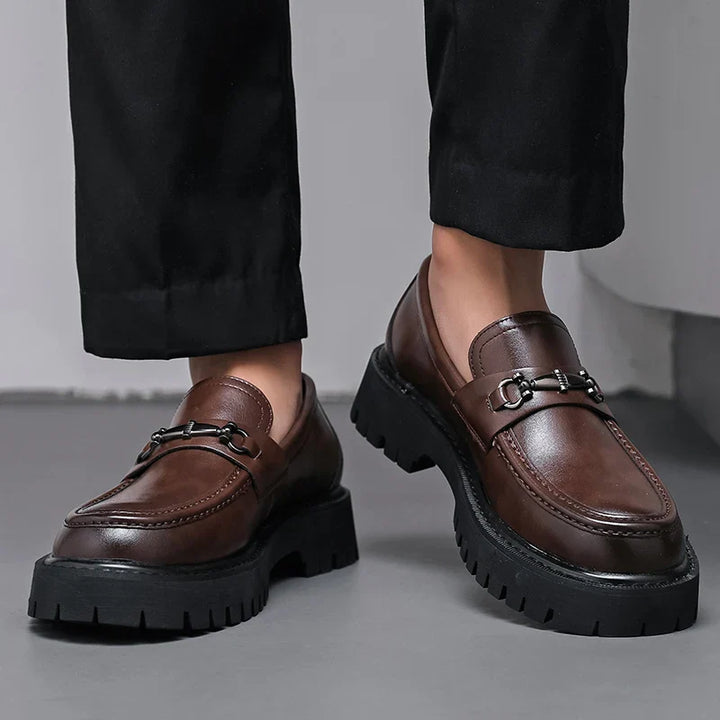 Stylish men's professional footwear, slip-on polished loafers designed for comfort and elegance.