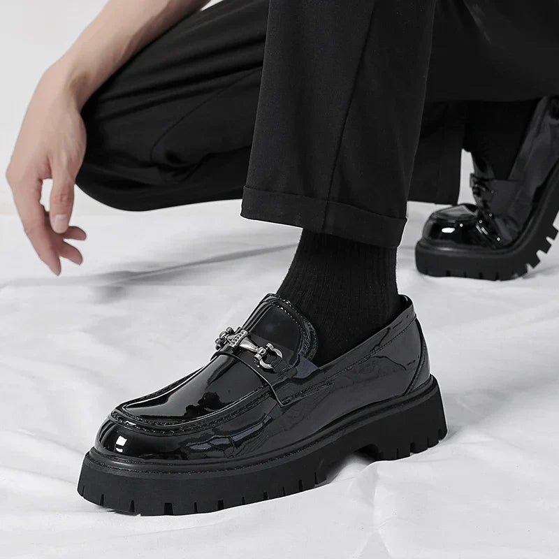 Men's fashion footwear: elegant polished loafers, offering a comfortable and professional dress shoe option.