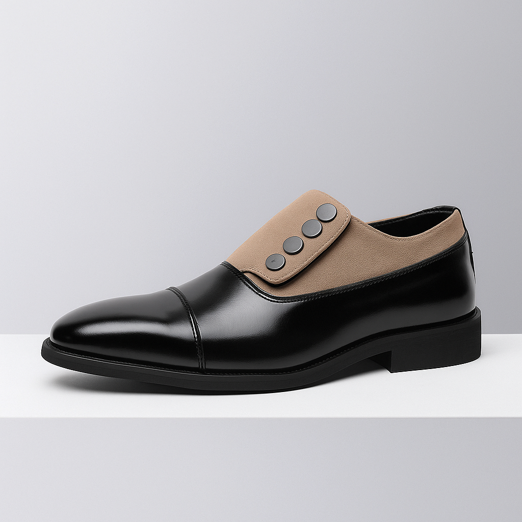 Pair of men's black polished leather slip-on loafers, showcasing the sleek formal design.