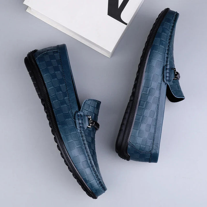 Dark brown leather bit loafers for men, perfect for business casual or formal events.