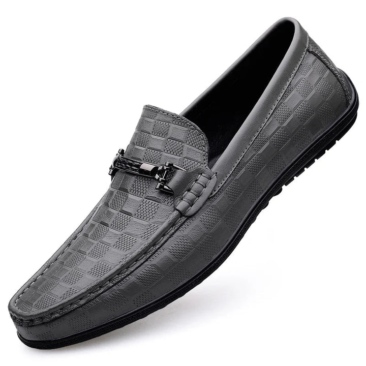 Elegant men's dress shoes: premium leather bit loafers with a sleek, polished finish.
