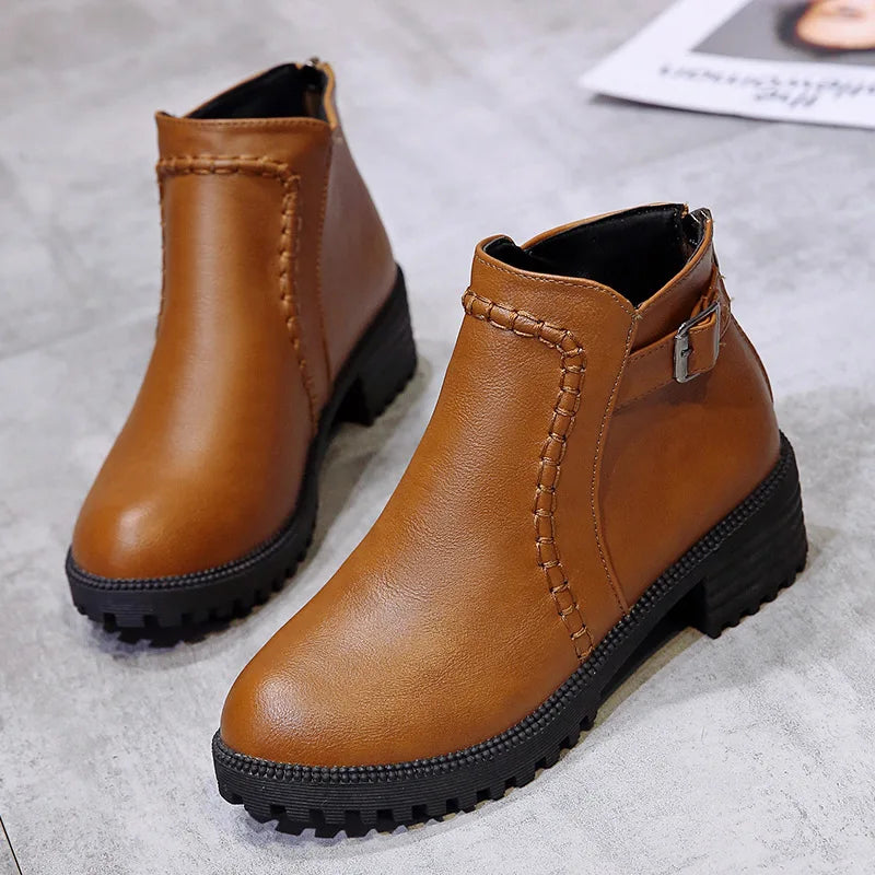Front view of men's durable brown leather ankle boots, orthopedic design for comfort and stylish wear