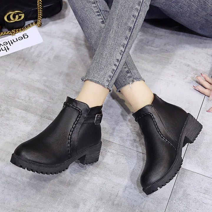 High-top men's black leather ankle boots with orthopedic features, ideal for fashion and durability