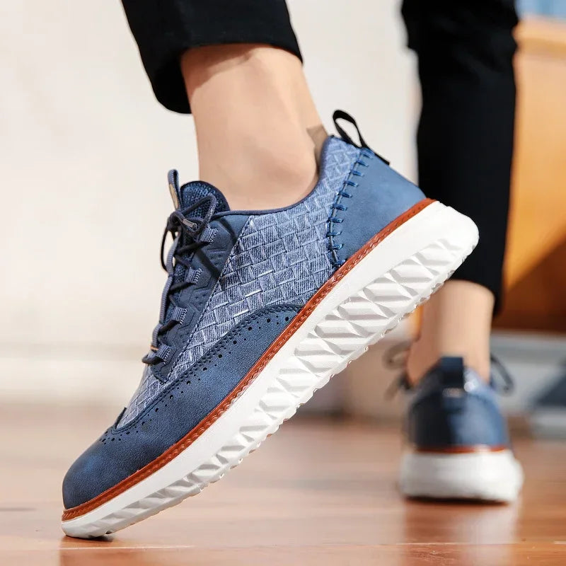 Front view of men's comfortable leather athletic sneakers, suitable for active lifestyles.