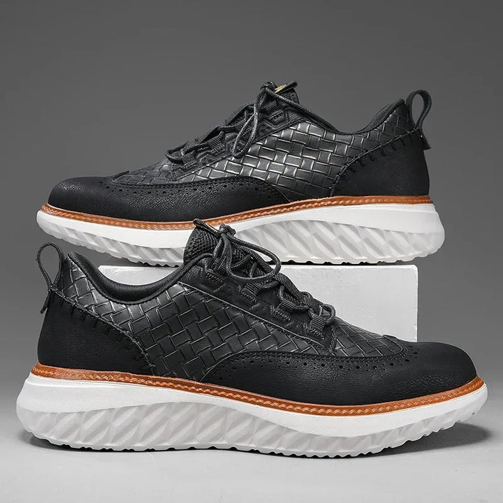 High-angle shot of breathable men's leather shoes, ideal orthopedic footwear for foot health.
