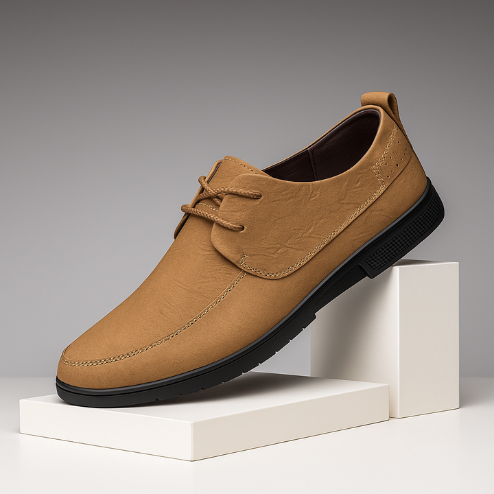 Close-up of the rich texture on Men's Brown Leather Slip-On Loafers, perfect for formal events