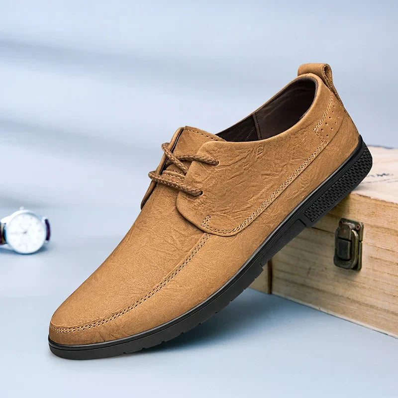 Different angles of beige men's leather loafers, showcasing the versatility of this dress shoe