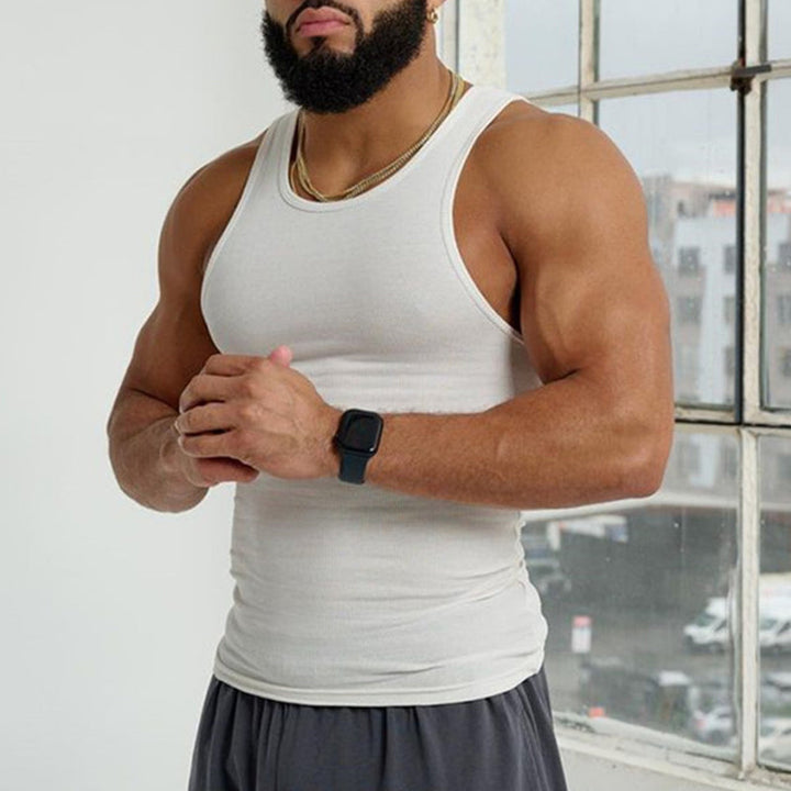 Men's premium sleeveless tank top, lightweight cotton blend, suitable for gym and summer activities.