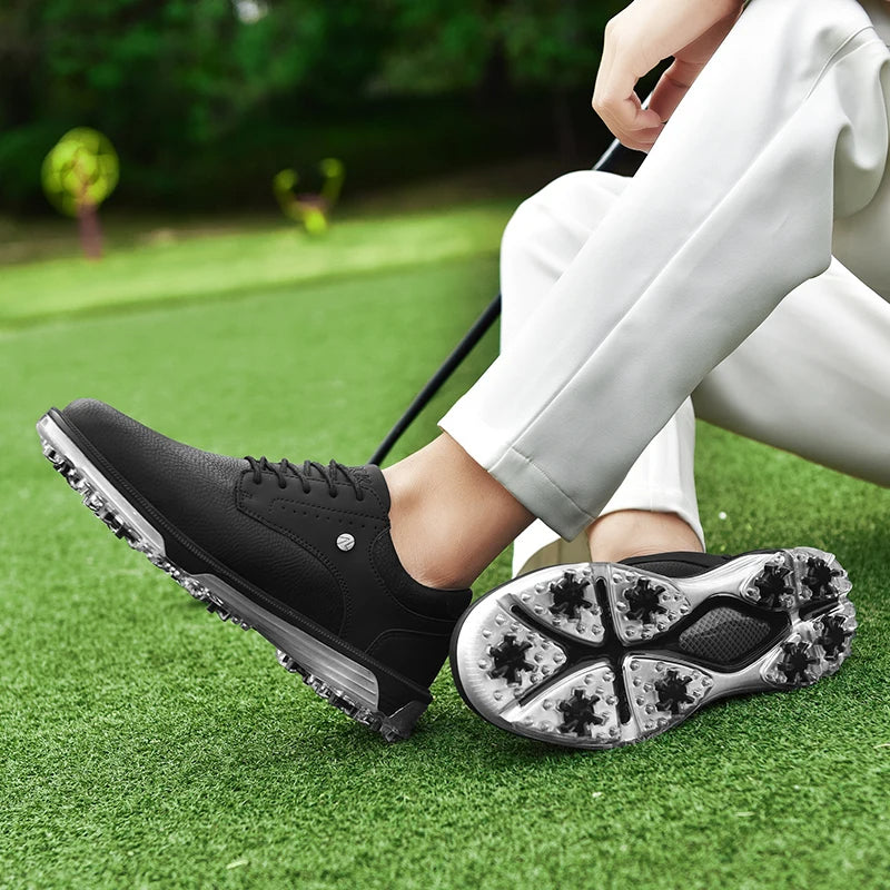 Black waterproof Men's Golf Shoes, Pro Edition, ensuring a stable grip & comfortable experience.