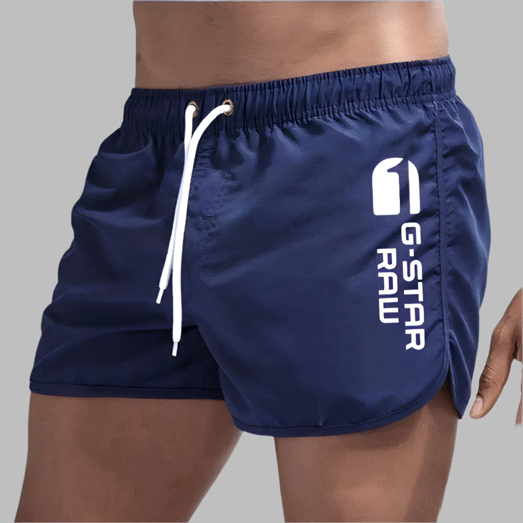 Men's quick-dry athletic swimwear for active beach & pool days. Perfect fast-drying trunks for water sports & summer.