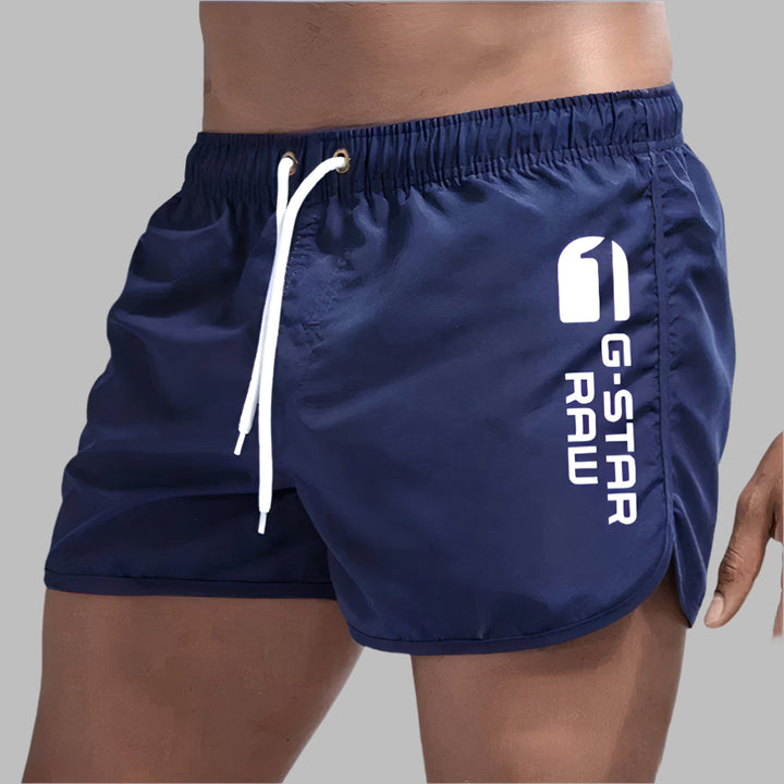 Men's quick-dry athletic swimwear for active beach & pool days. Perfect fast-drying trunks for water sports & summer.