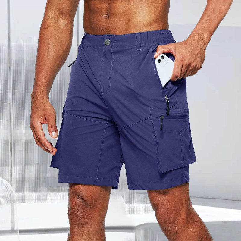 Model from the waist down in men's quick-dry cargo shorts, walking outdoors.