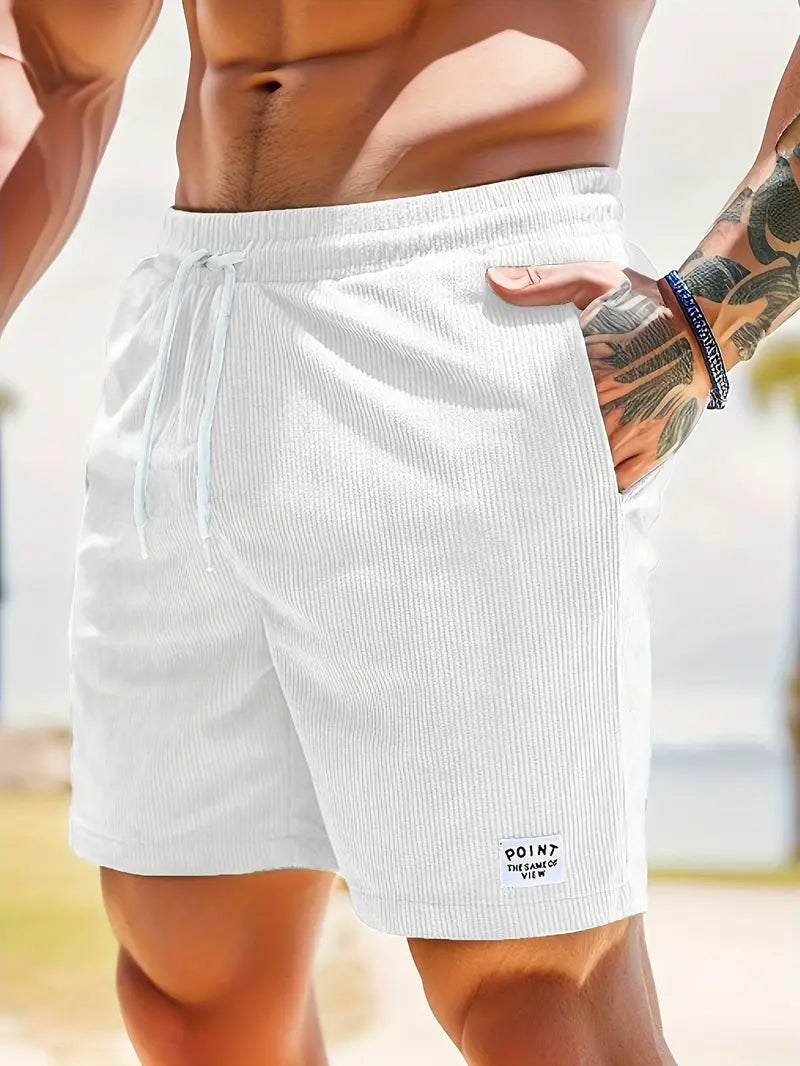 Quick-dry men's swim shorts. Casual, multi-color, elastic waist for beach and pool. Summer essential.