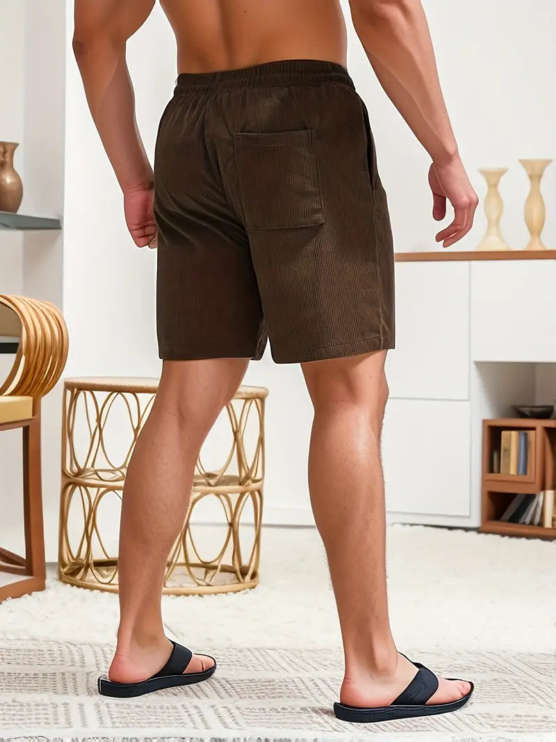 Athletic men's quick-dry shorts. Ideal for swimming, beach sports, or casual summer outings.