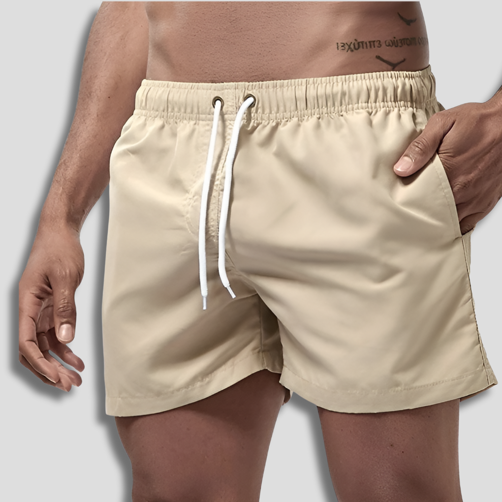 Performance men's quick-dry board shorts, engineered for maximum comfort in water and on sand.