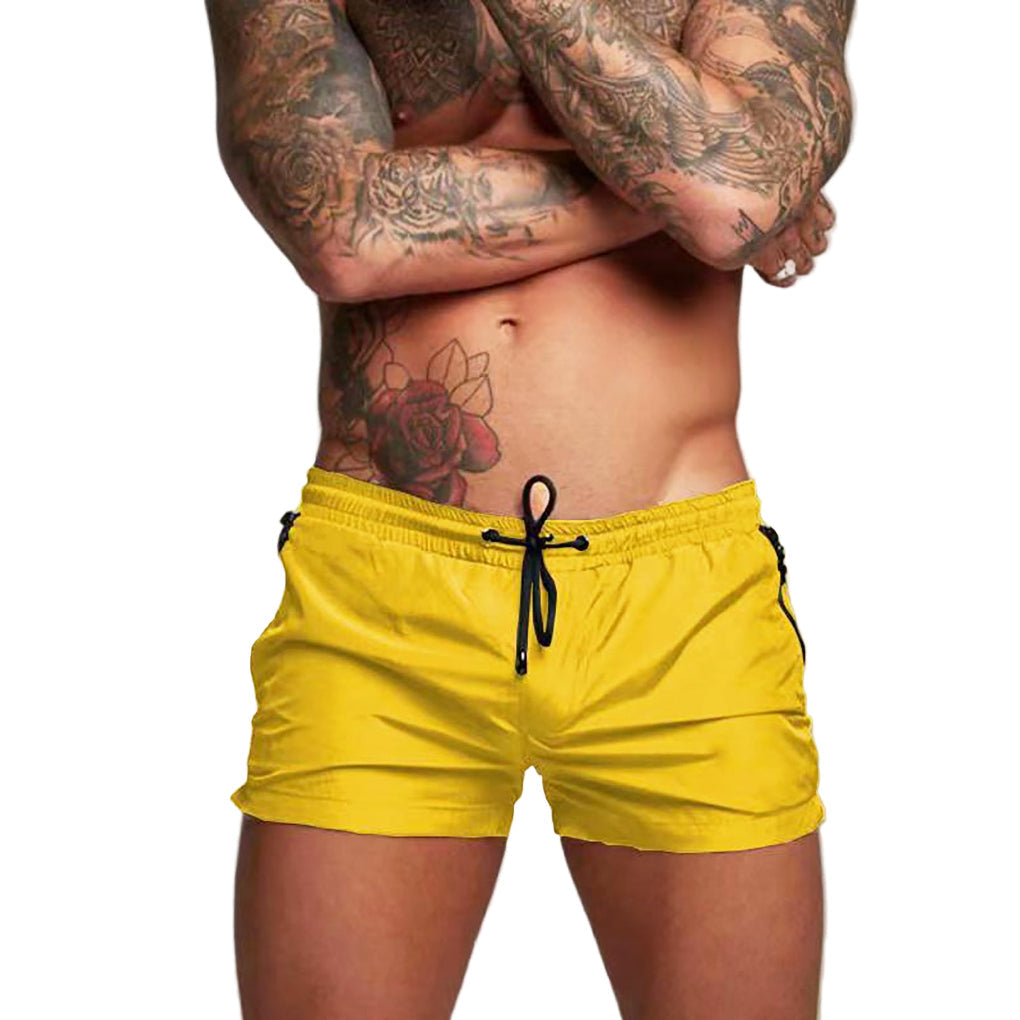 Durable men's quick-dry swim shorts, versatile for all water sports & vacation wear.