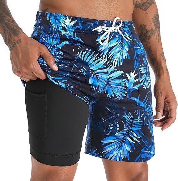 Stylish men's quick-dry board shorts with a supportive compression liner, perfect for summer beachwear.