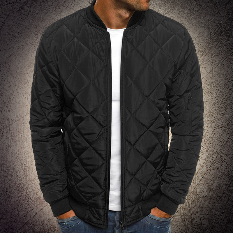 Close-up of the quilted pattern on a men's lightweight bomber jacket, showcasing texture.