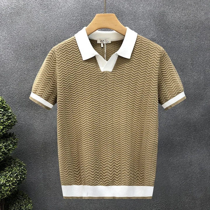 Men's refined textured knit polo shirt, ideal for smart casual wear. Comfortable collared men's fashion top for spring.
