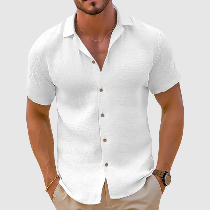 Versatile men's collared short sleeve shirt in a relaxed fit, great for travel & leisure.