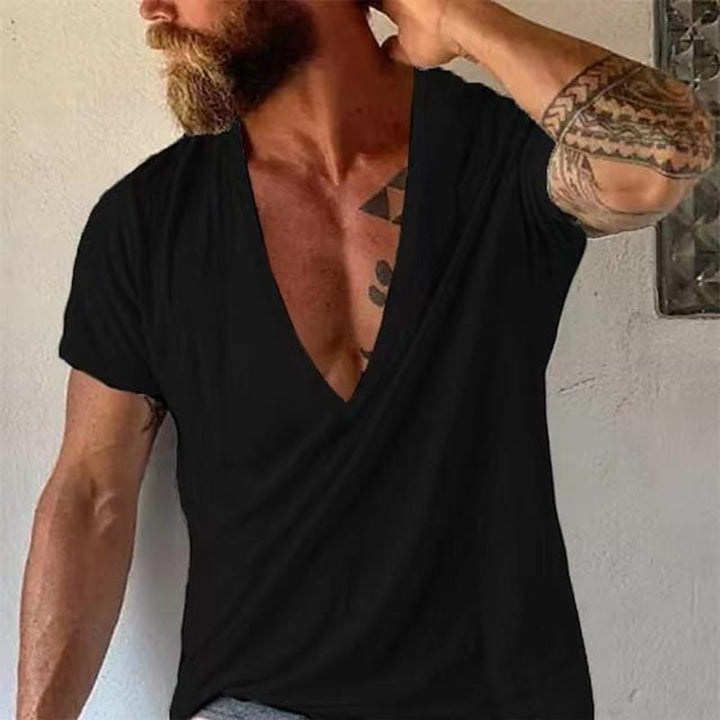 Minimalist men's deep V-neck summer top in black, relaxed fit, offering ultimate comfort.