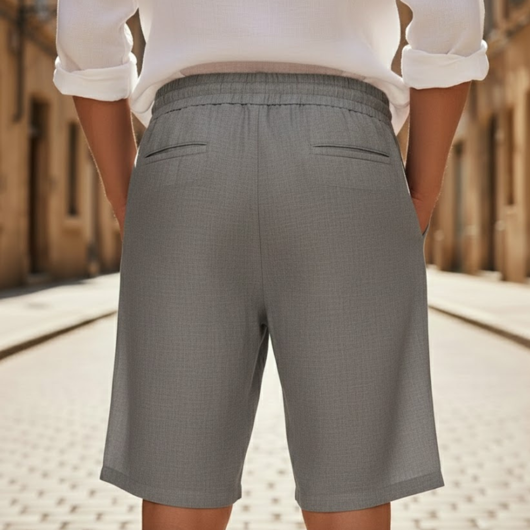 Comfortable men's knee-length shorts with elastic drawstring waist for relaxed summer casual outfits.