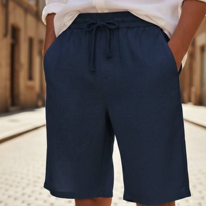 Versatile men's relaxed fit shorts with an elastic drawstring waist, ideal for summer and casual wear.