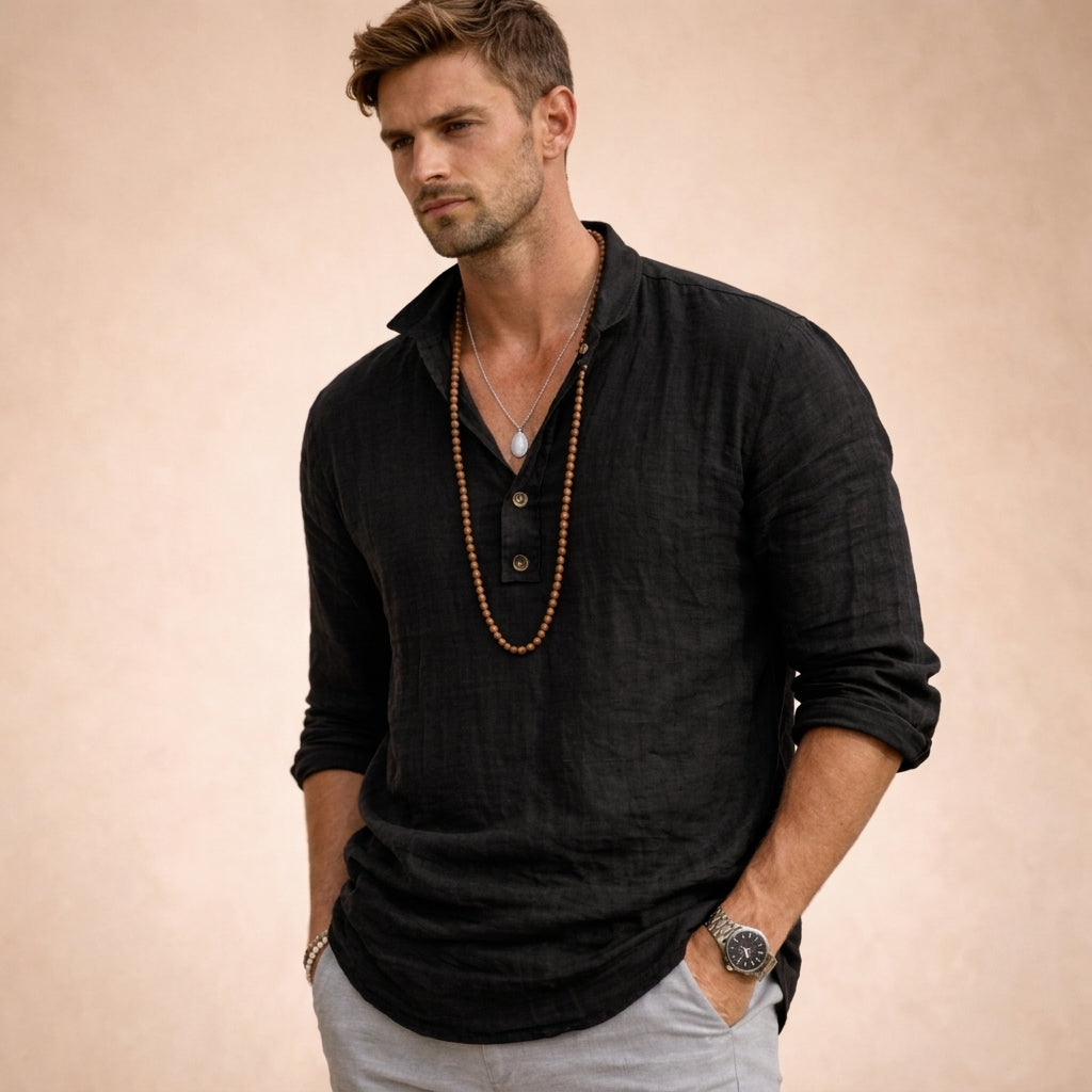 Blue men's relaxed fit long sleeve button-down shirt. Stylish & breathable for summer fashion and resort wear.