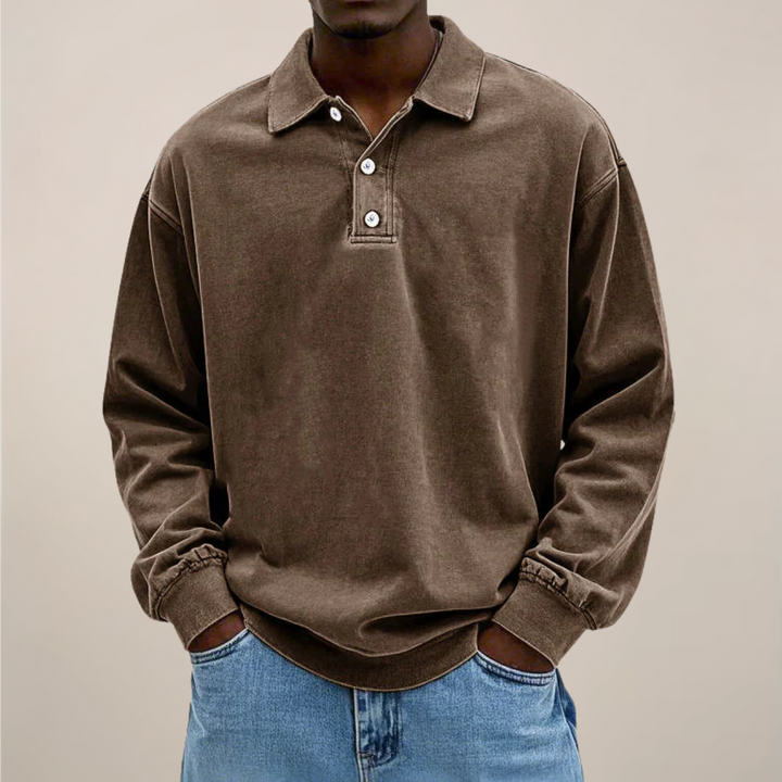 Stylish men's long sleeve polo shirt with button placket. Essential for smart casual and everyday fashion.