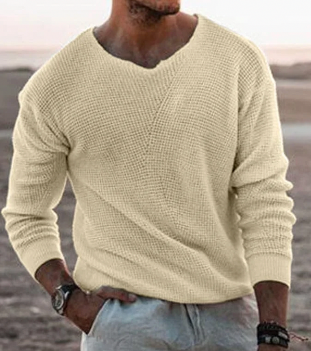 Relaxed fit men's long-sleeve waffle knit sweater, a cozy and versatile casual knitwear piece.
