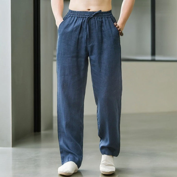 Men's relaxed Palmara travel pants with elastic waist, perfect for versatile comfort & adventures.