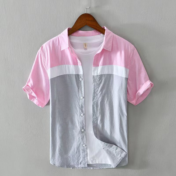 Comfortable men's relaxed fit shirt with stylish contrast panels, a modern short sleeve fashion essential.