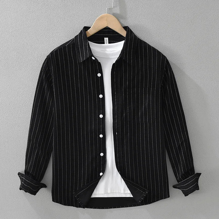 Comfortable men's relaxed fit button-up shirt with classic stripes. Long-sleeve collared design, ideal for everyday style.