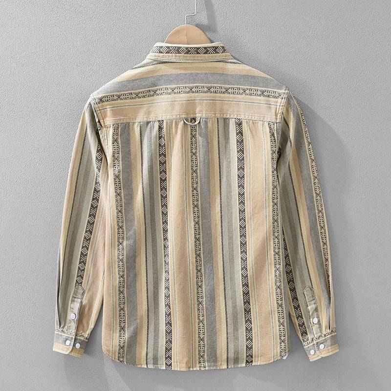 Casual men's striped Medina shirt, relaxed fit, styled open for summer. Everyday button-down, textured fabric.